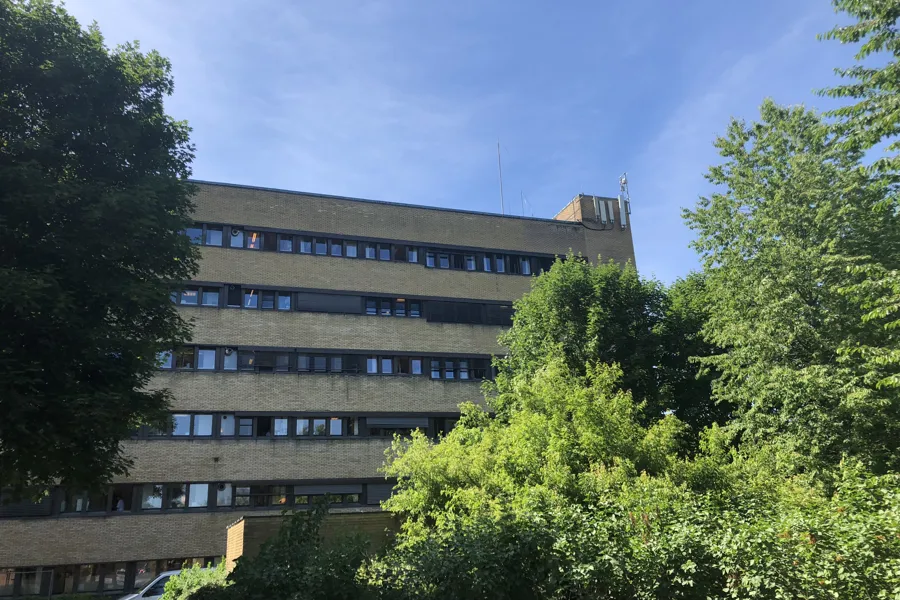 A building with trees in front of it